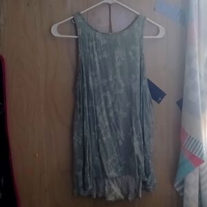 Woman's flowy green with white floral top